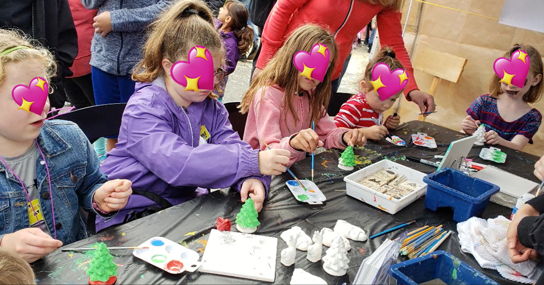 Children painting ceramic pieces
